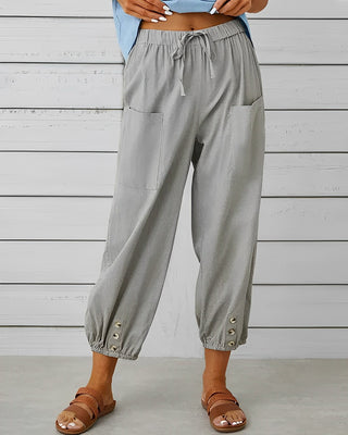 Leva | Women’s Loose-Fitting Trousers with Gold-Toned Button Detail