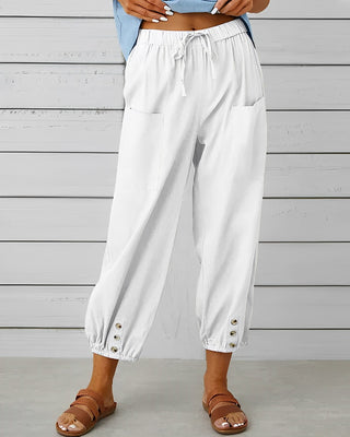Leva | Women’s Loose-Fitting Trousers with Gold-Toned Button Detail
