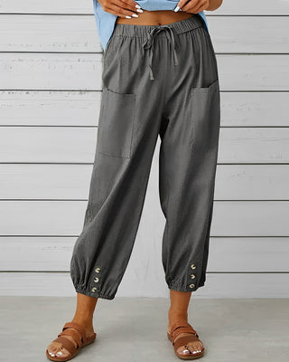 Leva | Women’s Loose-Fitting Trousers with Gold-Toned Button Detail