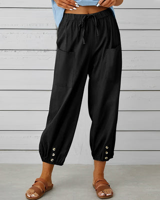 Leva | Women’s Loose-Fitting Trousers with Gold-Toned Button Detail