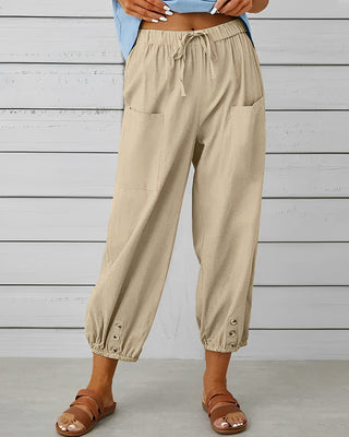 Leva | Women’s Loose-Fitting Trousers with Gold-Toned Button Detail
