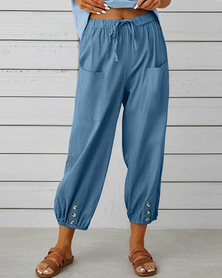 Leva | Women’s Loose-Fitting Trousers with Gold-Toned Button Detail