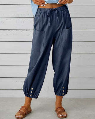 Leva | Women’s Loose-Fitting Trousers with Gold-Toned Button Detail